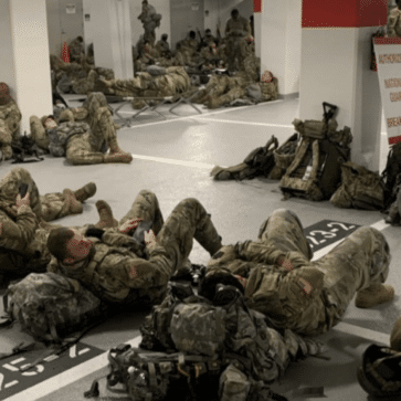 national guard troops sleep in garage